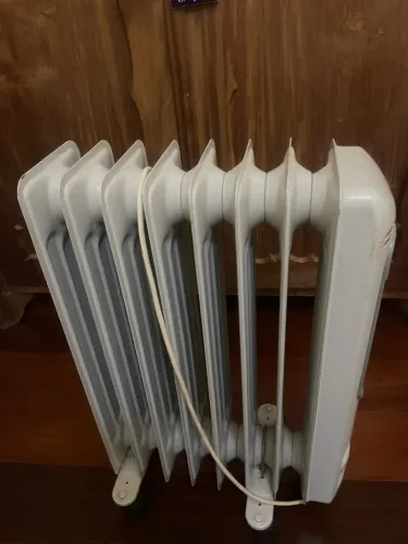Aquecedor a óleo elétrico