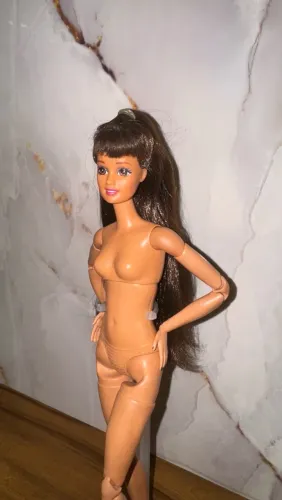 Barbie Teresa songbird made to move