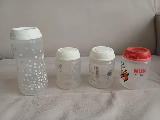 Mamadeira Nuk sem bico 300 ml + recipientes para leite usados