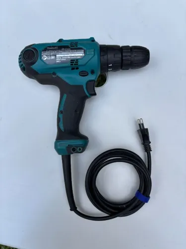 Parafusadeira/furadeira Impacto 220v / 3/8 320w Hp0300- Makita, excelente estado