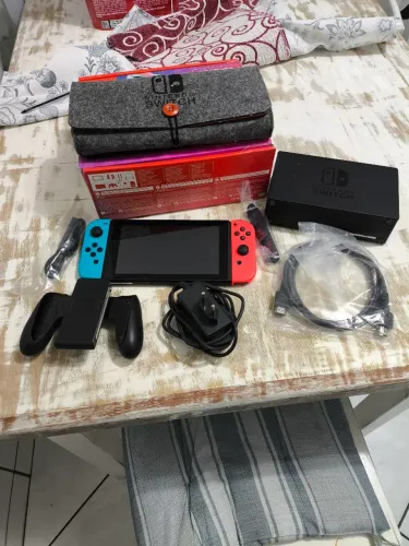 (ACEITO NEGOCIOAR) Nintendo switch v1 pouco usado com bolsa e cartão de memória de 128gb