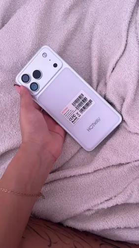 Celular novo, na caixa.