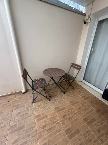 Mesa com cadeiras área externa