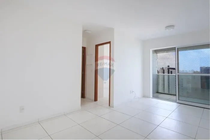 Apartamento de 60m com 2 quartos, sendo 1 suíte, varanda e cozinha. 1 Vaga de garage, laze