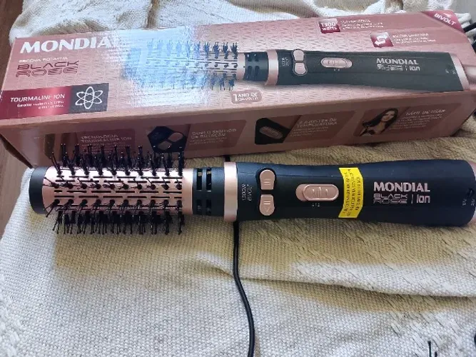 Escova modeladora giratória
