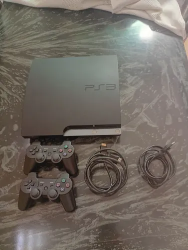 Ps3 desbloqueado hen, com 2 manetes e 3 lojinhas em perfeito estado, pouco tempo de uso