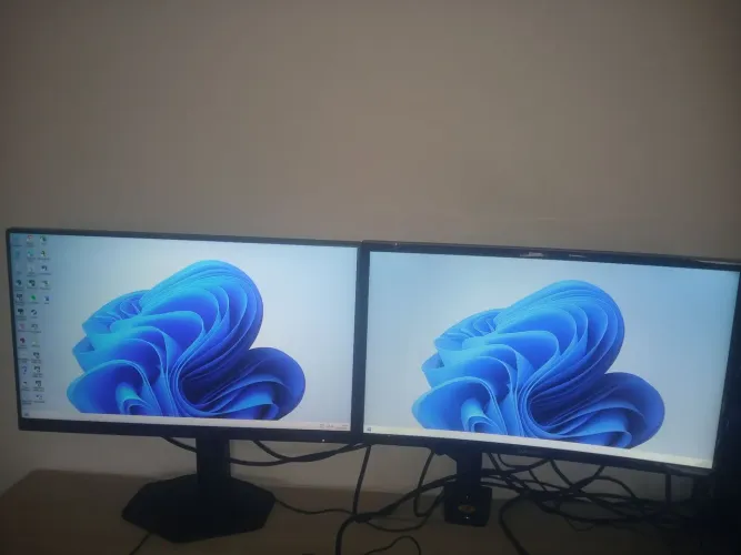 Troco dois monitores de 24 por um maior AOC 180, Samsung curvo