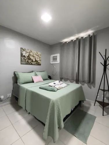 Alugo apt mobíliado com 2/4 c/2 banheiros, a 6,5 km do aeroporto internacional.