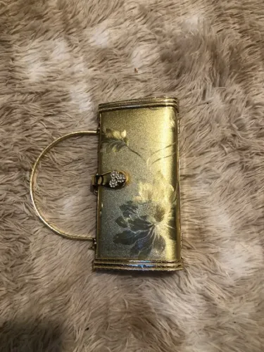 Vendo bolsa dourada de festa