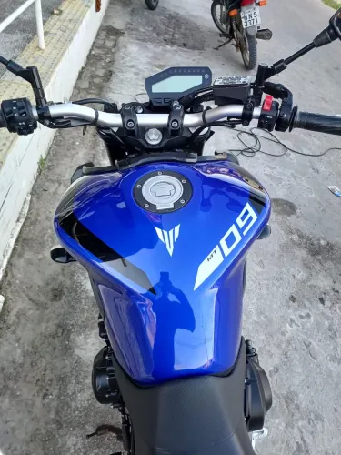 Moto de procedência e revisada