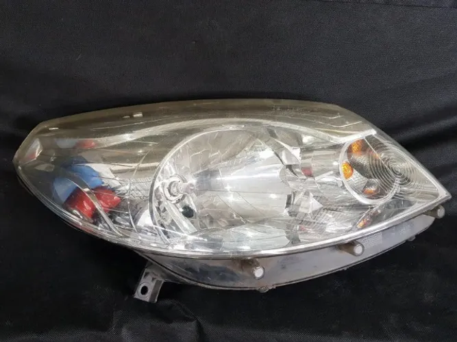 Farol Sandero cromado original.