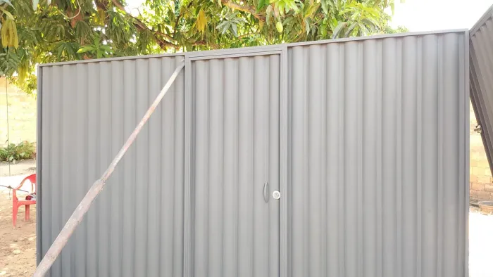 Portão com porta 1200 na chapa preta tamanho padrão