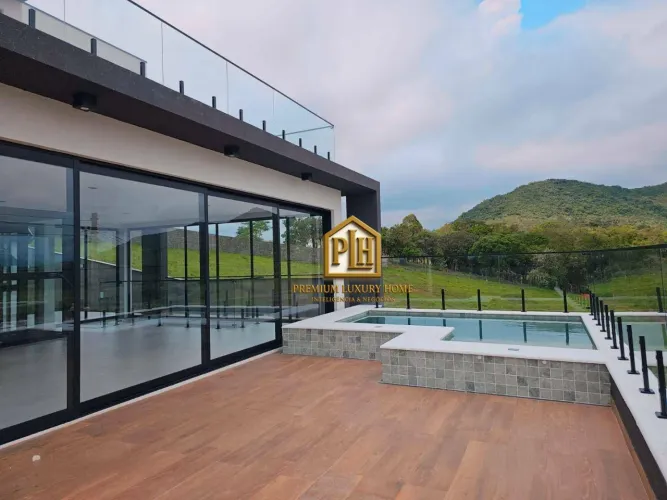 Casa com 3 dormitórios à venda, 346 m² por R$ 2.297.000,00 - Condomínio Greenfield - Atiba