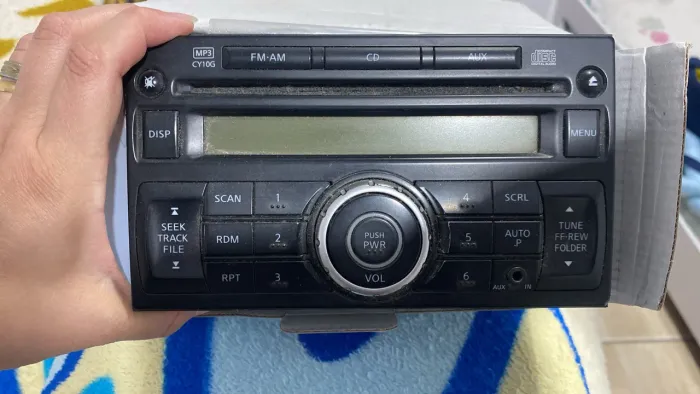 Rádio original de carro Nissan