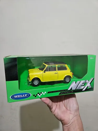 Miniatura Mini Cooper 1300 Amarelo Welly 1/24<br>(0)