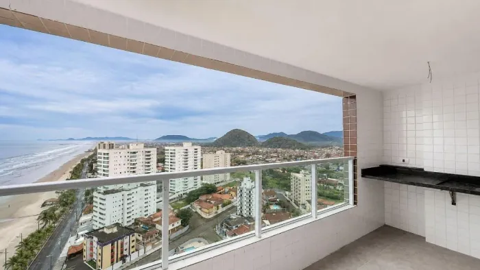 Apartamento com 2 quartos à venda em Mongaguá | 67,55m² | 1 suíte | vista lateral mar | la