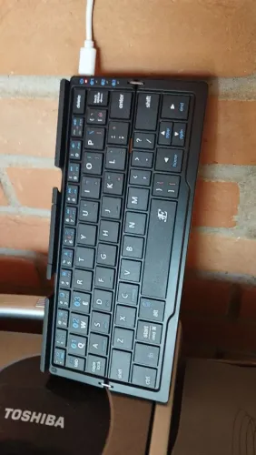 Teclado sem fio tablet celular computador , controla até 3 aparelhos 