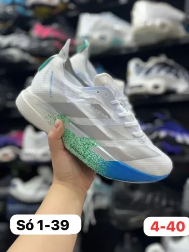 Tênis corrida Adidas adzero importado 