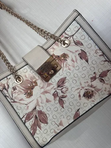Bolsa guess los angeles branca detalhes flores 