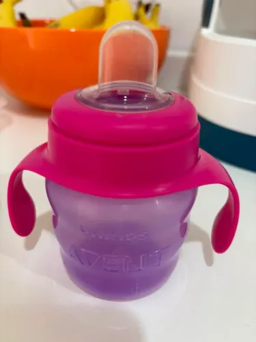Copo infantil e colher dosadora