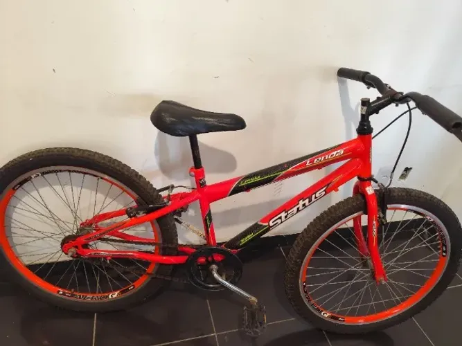 Vendo bicicleta aro 26 semi-nova.valor 250 criança até 1.50 altura