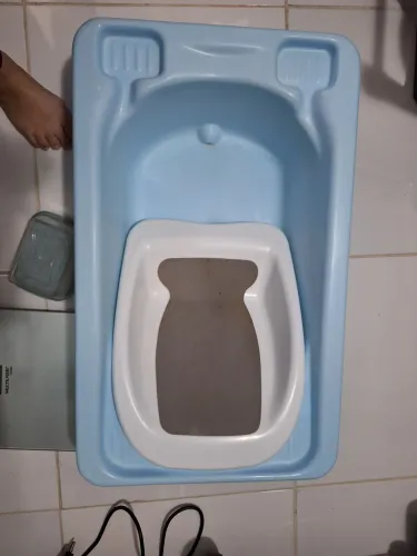 Vendo Banheira de bebê, com assento redutor.
