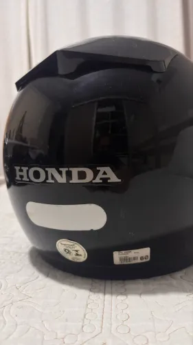 Vendo capacete Honda nº 60, em perfeito estado.