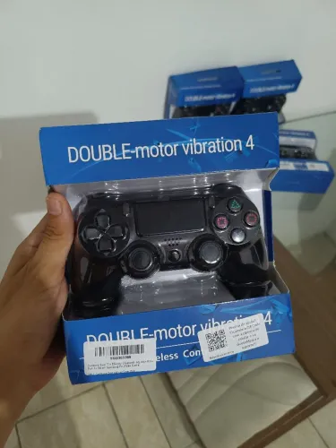 Controle de PS4 na caixa