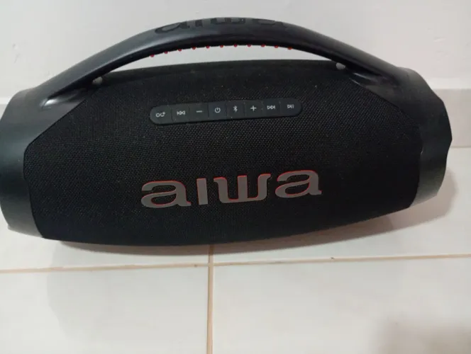 Cx de som sem avarias. Com carregador original