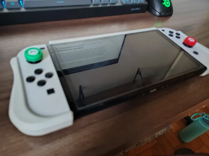 NINTENDO SWITCH OLED 64GB DESBLOQUEADO + 2 CONTROLE DATA FROG S80