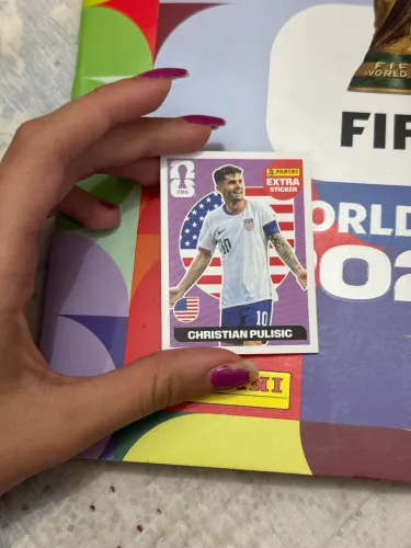FIGURINHA EXTRA, cristian pulisic (roxa) 