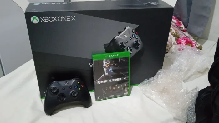 Vendo Xbox one x semi-novo
