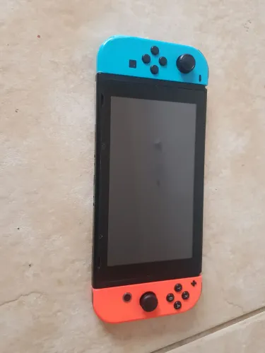 NINTENDO SWITCH V 1 COM DOIS JOGOS, MARIOKART E ZELDA TEARS OF THE KINGDOM CONTROLES