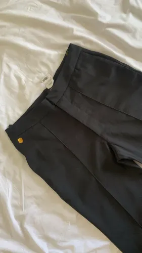 Calça preta flair osklen