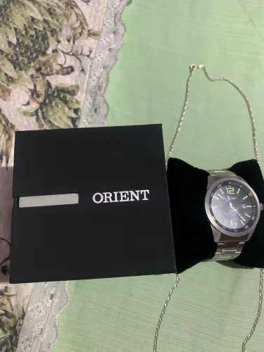 Relógio e cordão de prata 