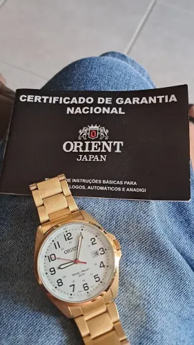 Relógio oriente foleado a ouro
