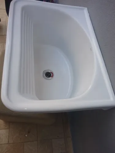Tanque Novo de louça Deca sem coluna acompanha válvula Inox medindo 50cm