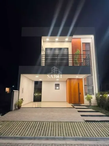 YA/Casa Moderna, projetada para oferecer conforto em condomínio fechado.