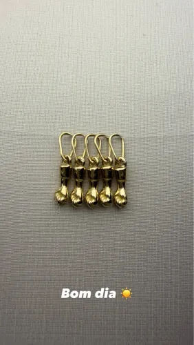 Berloque em ouro 18k figa