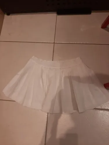 Saia plissada estilo tenista