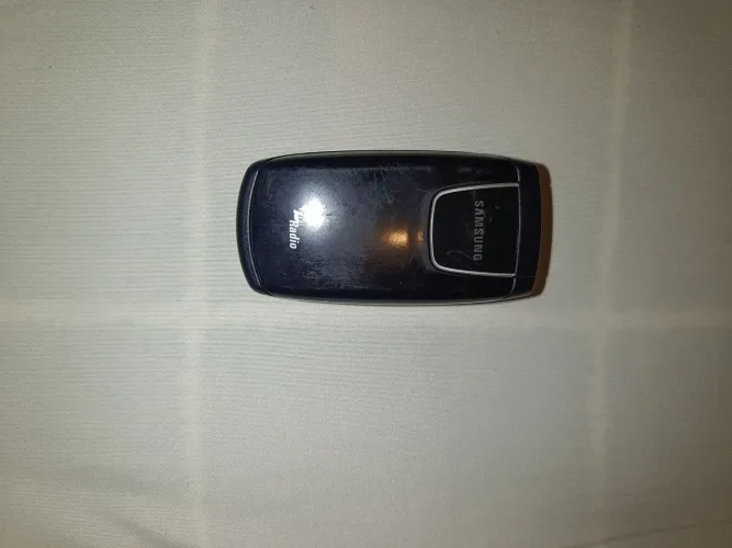 Kit com 2 celulares Samsung vintages, com carregador vintage