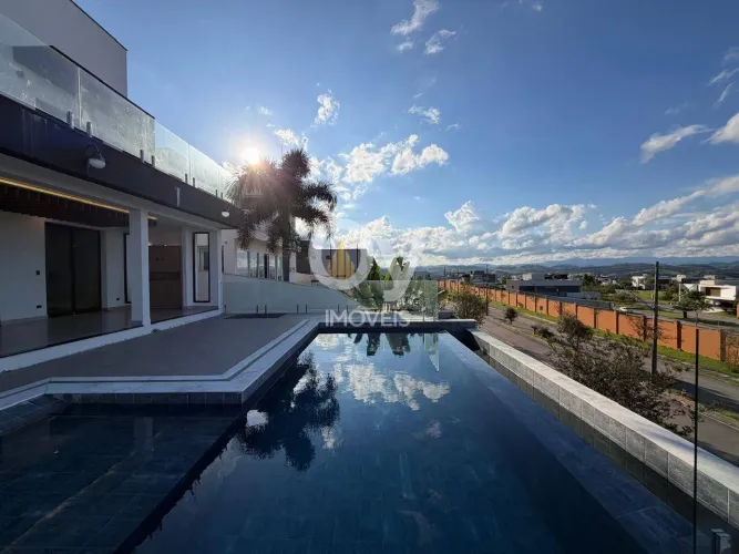 Casa de Luxo Urbanova SJC | 5 Suítes, Cinema e Piscina Borda Infinita
