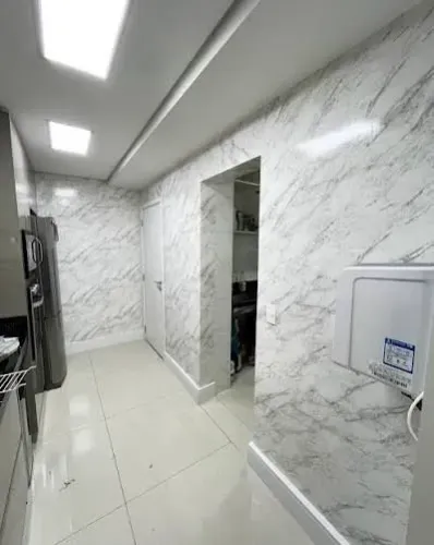 Instalador de papel de parede