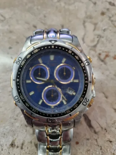 Relógio BULOVA Marine Star Cronógrafo Alarme caixa inox com dourafoORIGINAL - Fundo azul