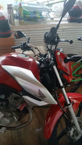 Vendo essa moto completa bem conservada sem nenhum defeito
