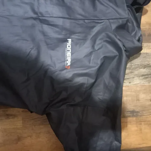 capa de chuva  moto semi nova ( pioneira)