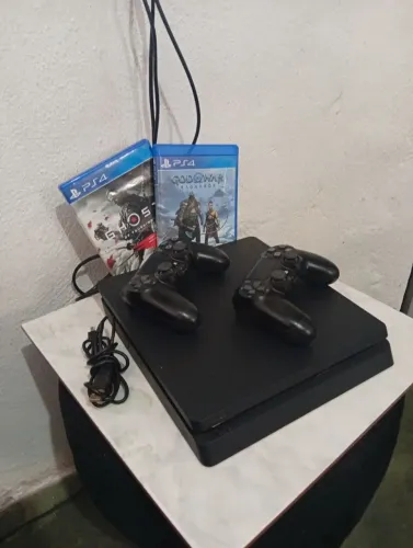 Ps4 slim com 1tb e leva 2 jogos