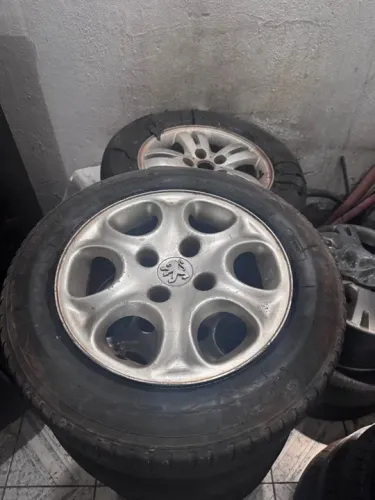 Jogo de roda peugeot 306 206 usada 14 pneus quebra galhos 