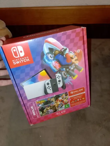 Nintendo Switch OLED (8 meses)