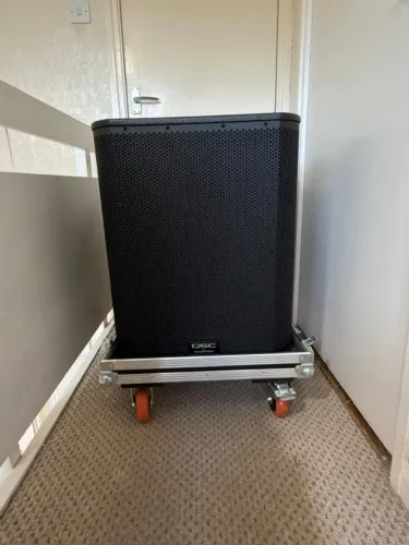 Pair of qsc ks118 subs with flight cases 3600w